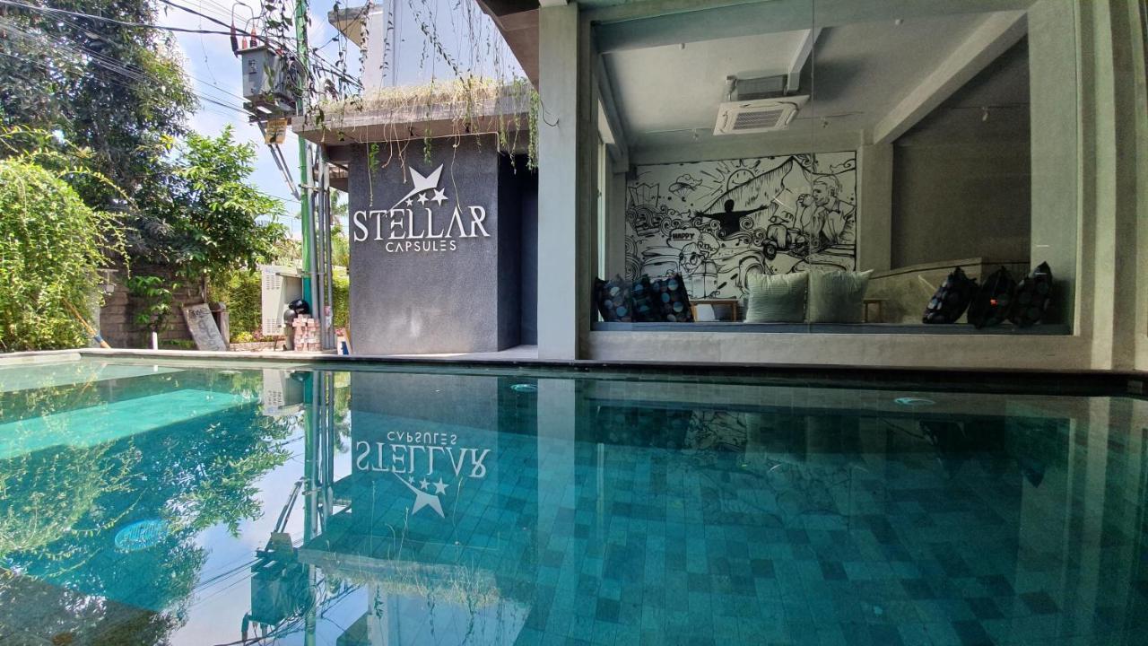 A Pousada Stellar Capsules Seminyak Exterior foto Stellar Pool